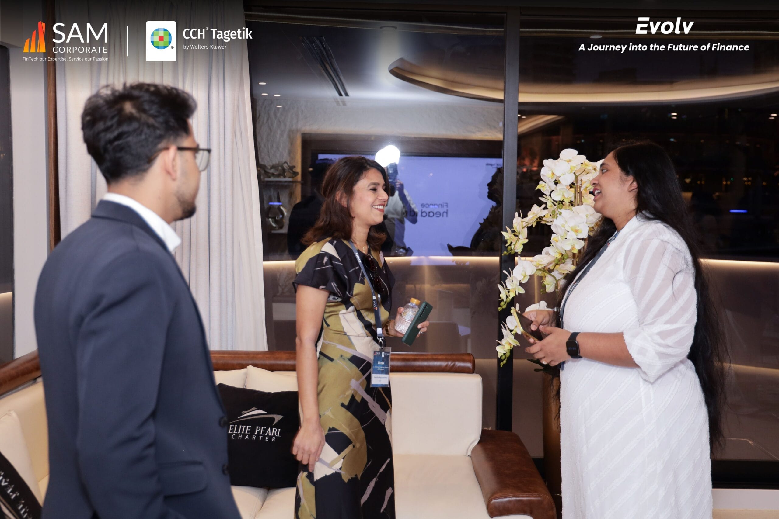 attendees discussing finance trends at the Evolv event, an exclusive gathering hosted by SAM Corporate and CCH Tagetik.