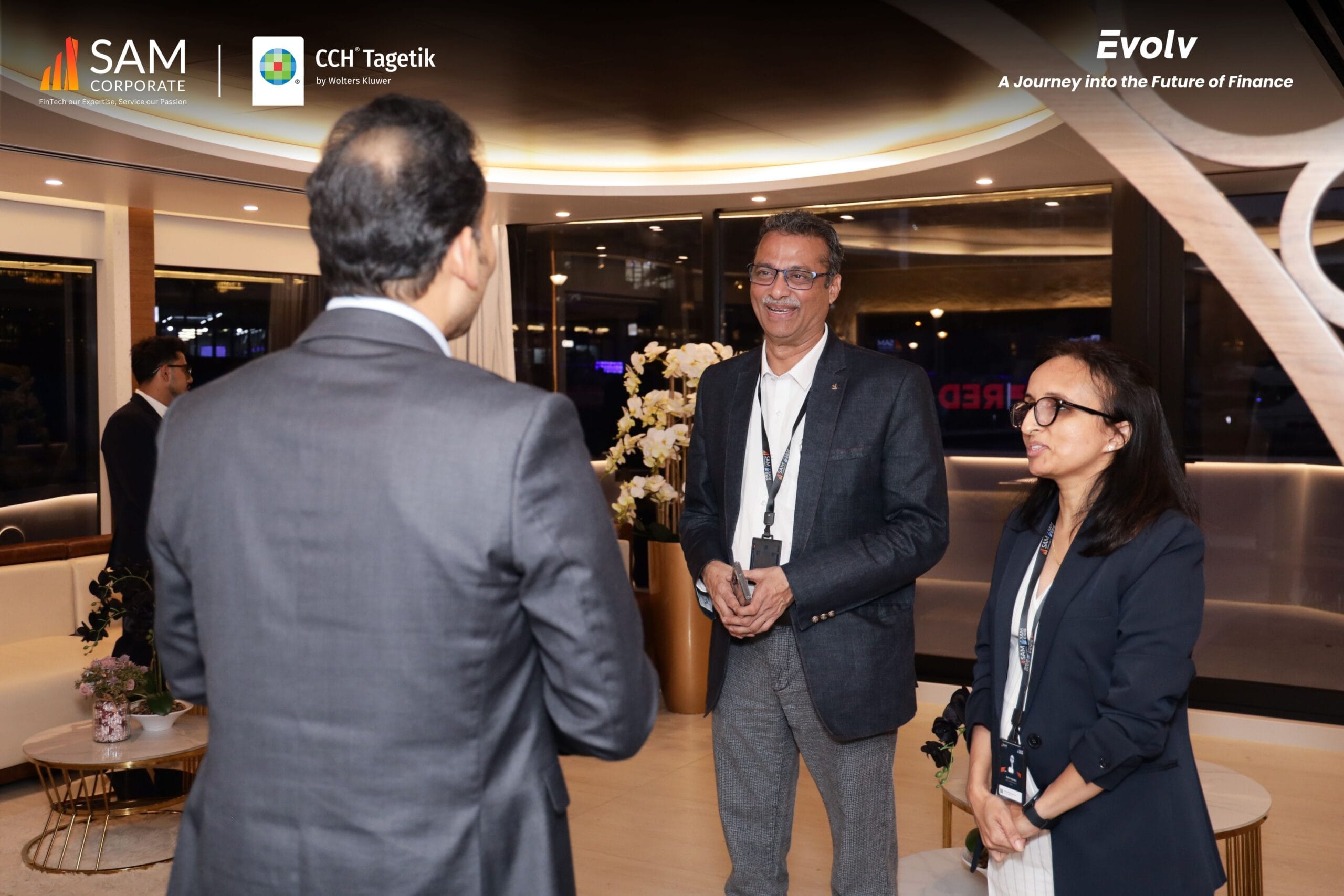 inance professionals networking at the Evolv event sponsored by SAM Corporate and CCH Tagetik.