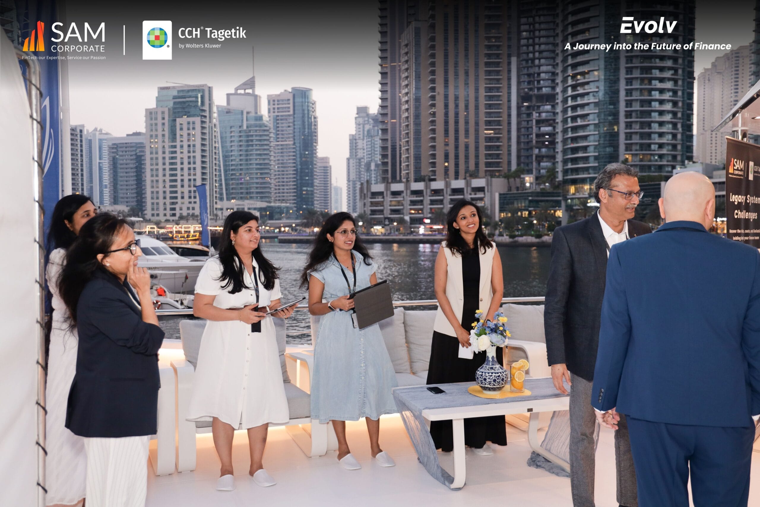 Group of attendees listening to a speaker at the exclusive Evolv event by SAM Corporate and CCH Tagetik in Dubai Marina.