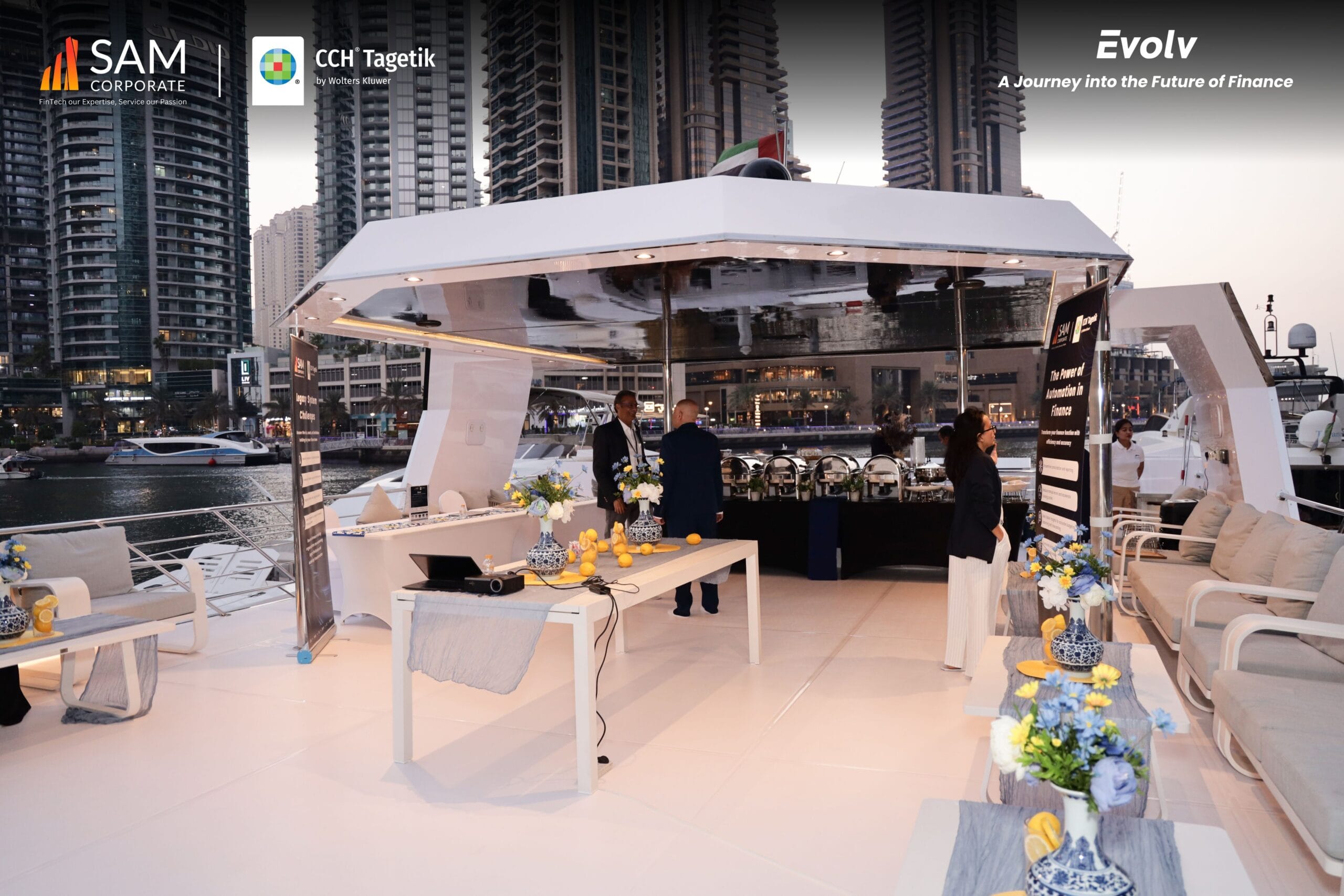The beautifully set-up yacht deck in Dubai Marina for the Evolv networking event by SAM Corporate and CCH Tagetik.