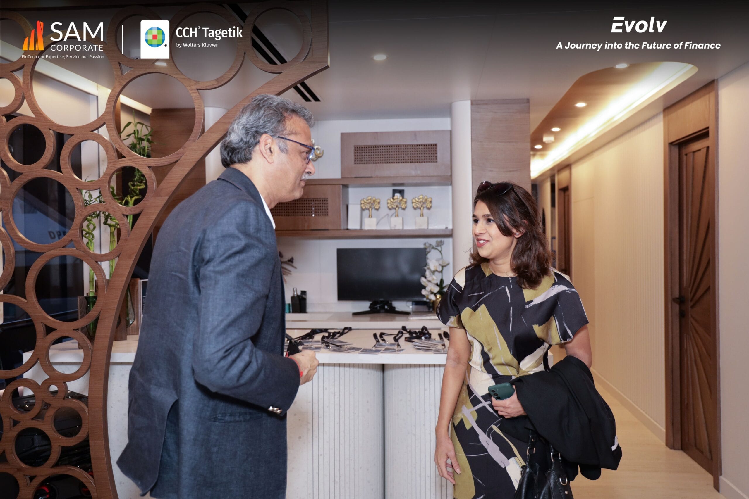 Evolv event guests networking in the SAM Corporate CCH Tagetik yacht lounge.