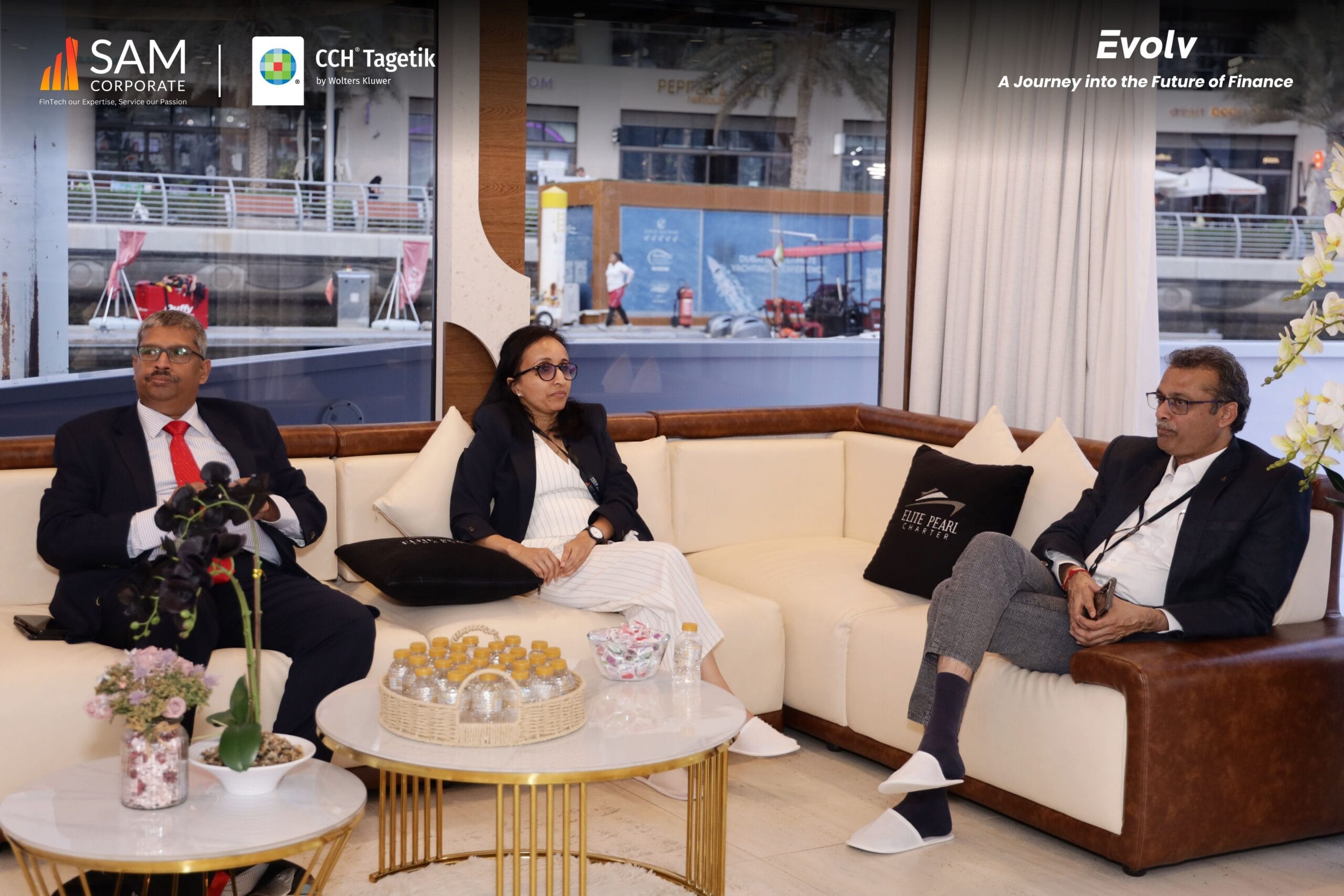 SAM Corporate and CCH Tagetik executives relaxing at the Evolv networking event on the yacht.