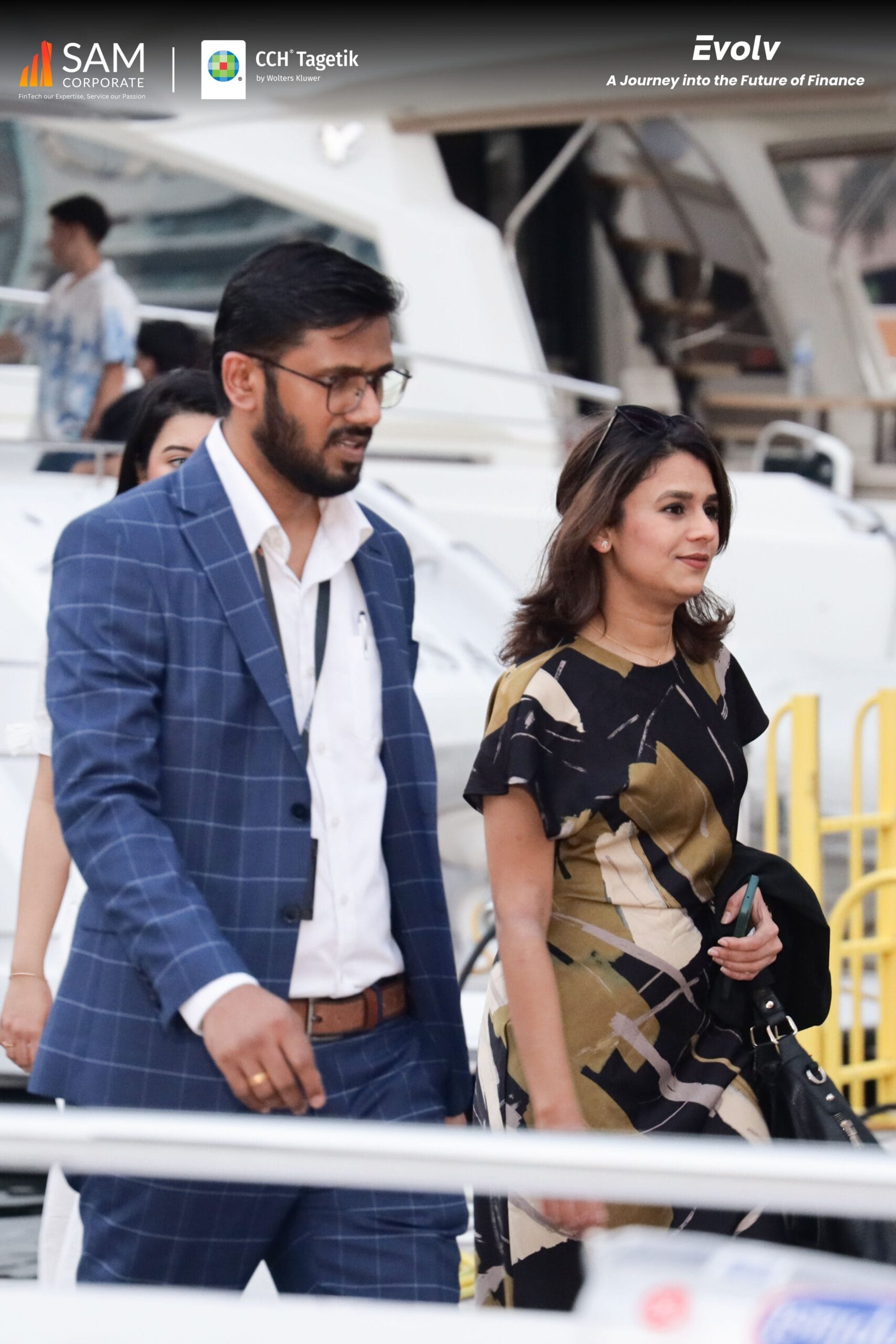 Guests arriving for the Evolv networking event hosted by SAM Corporate and CCH Tagetik, aboard a yacht for a journey into the future of finance.