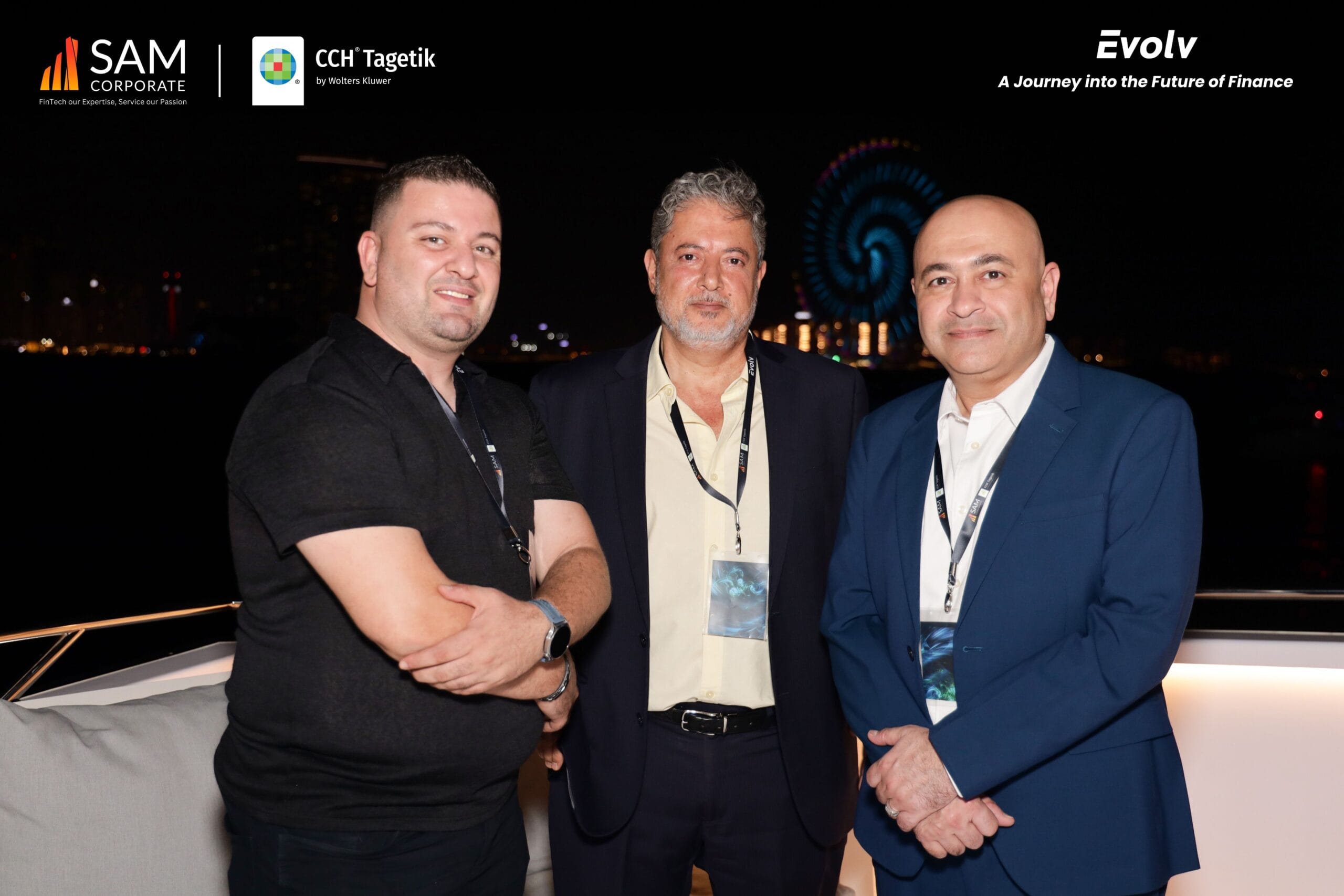 SAM Corporate and CCH Tagetik executives posing for a photo on the yacht deck during the Evolv networking event.