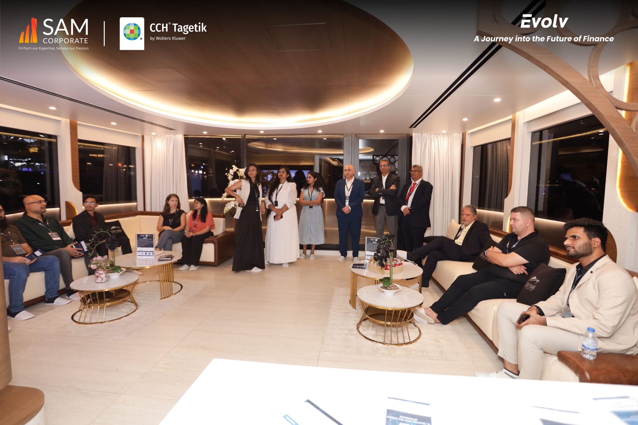 Full group photo of finance leaders in the lounge at the Evolv event hosted by SAM Corporate and CCH Tagetik.