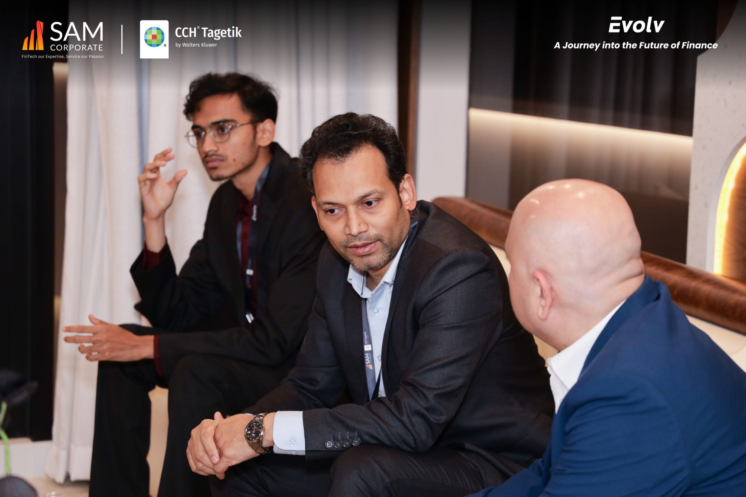 Executives discussing business strategy at the Evolv event, a thought leadership summit by SAM Corporate and CCH Tagetik.