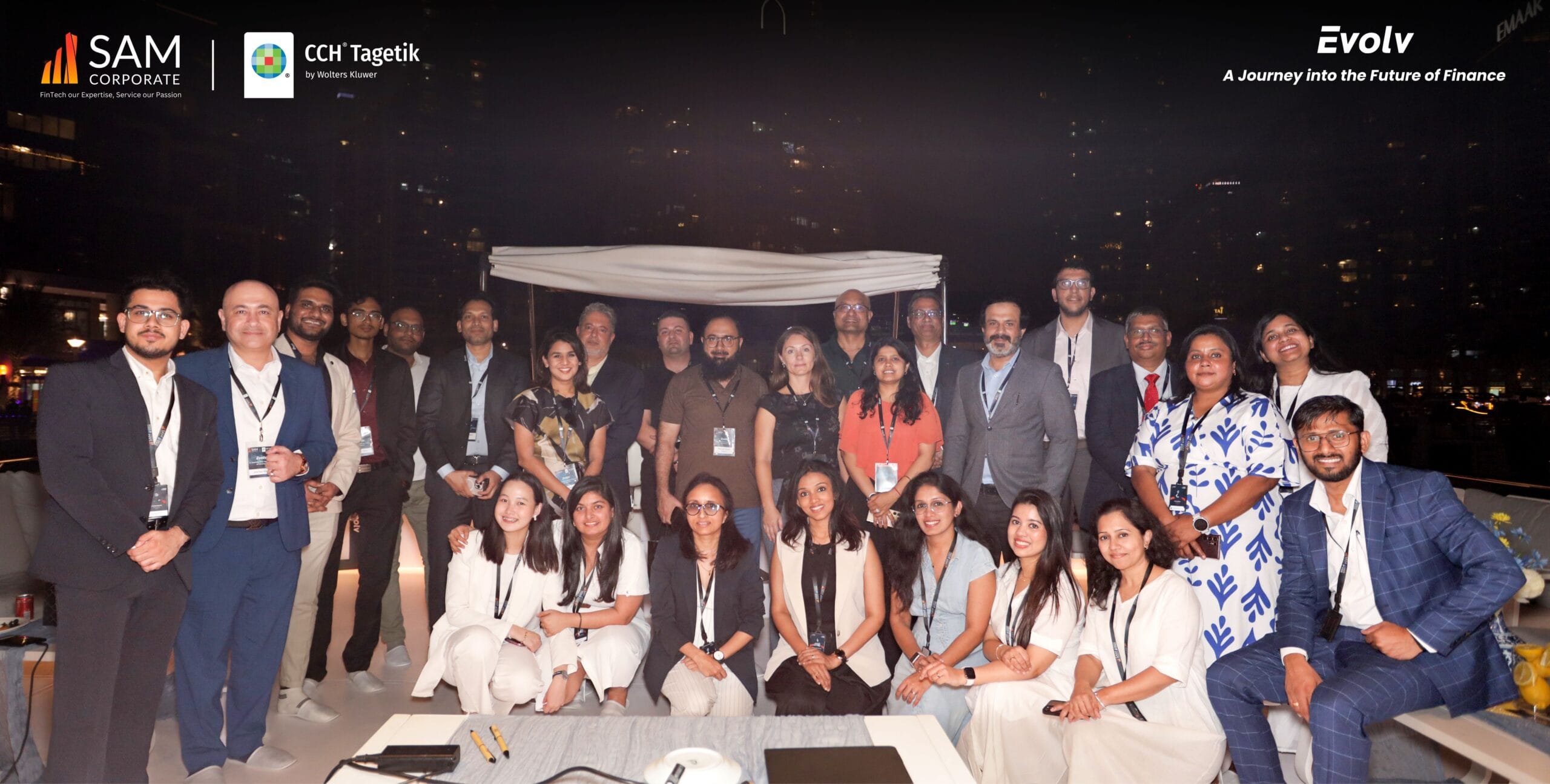 SAM Corporate and CCH Tagetik team members and guests at the Evolv event, a corporate gathering celebrating a journey into the future of finance.