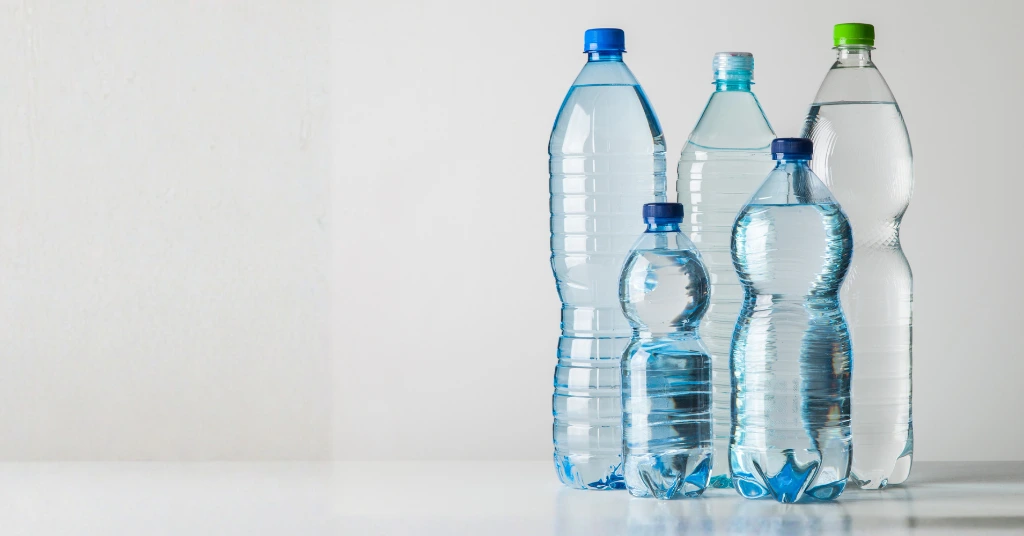 Assorted plastic water bottles illustrating pollution and environmental impact