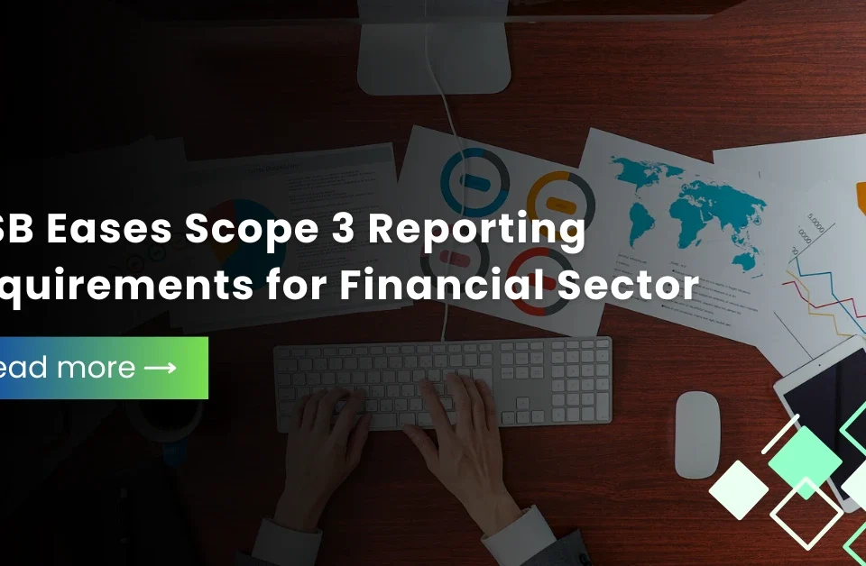 Financial professional reviewing charts and global data illustrating ISSB’s eased Scope 3 reporting requirements for the financial sector