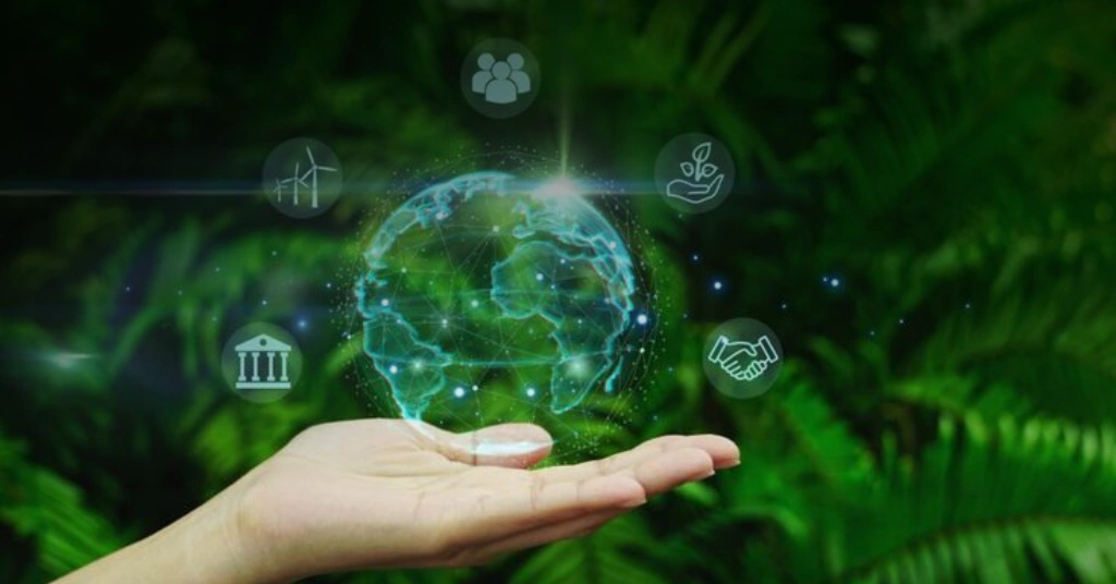 A hand holding a glowing digital globe surrounded by icons for environment, social, and governance (ESG) against a blurred green forest background.