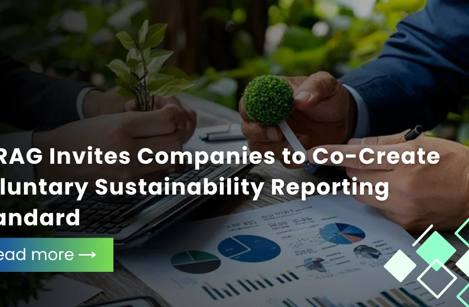 Corporate professionals discussing EFRAG voluntary sustainability reporting standards over financial charts.